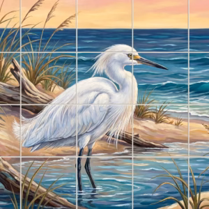 A tile mural of a white snowy egret standing on a sandy beach.