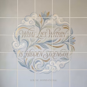 Inspirational quote tile mural with blue and gold floral details on a grey background.